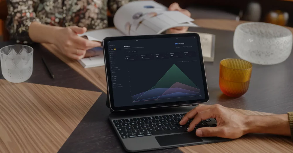 a laptop displaying analytics - dashboard dark mode 1